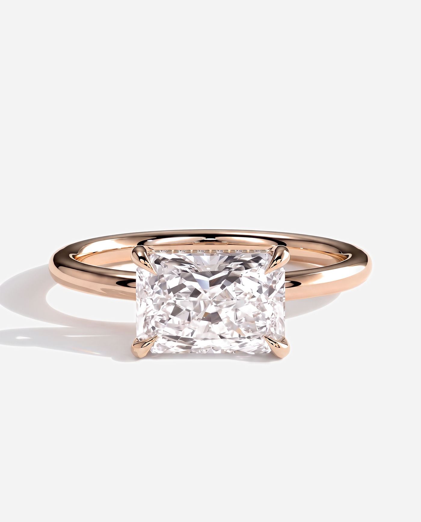 Tamsin Radiant East West Claw Solitaire with Hidden Halo Engagement Ring, lab grown diamond in rose gold, front view
