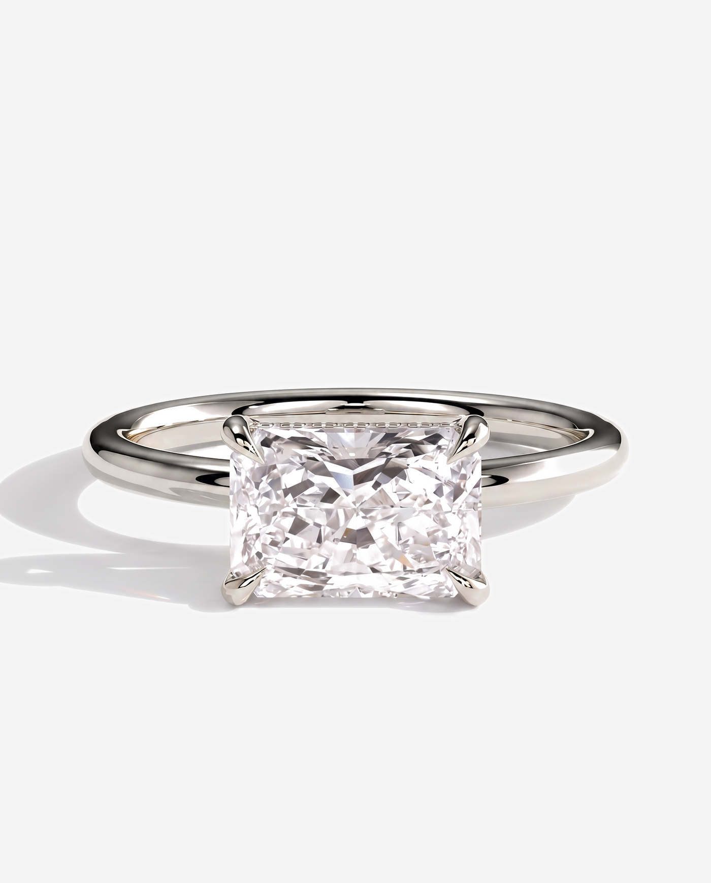 Tamsin Radiant East West Claw Solitaire with Hidden Halo Engagement Ring, lab grown diamond in platinum, front view