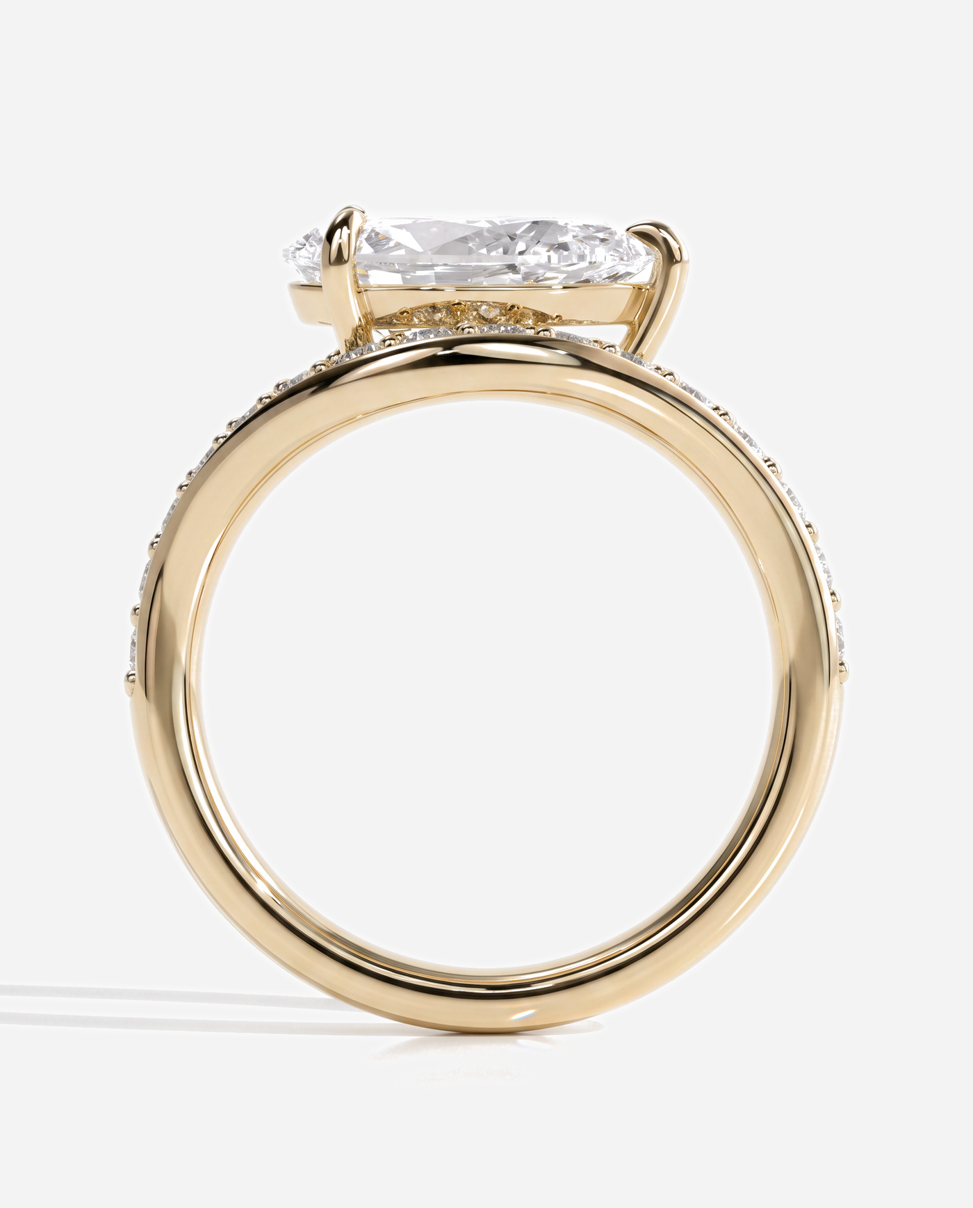 Ellis Pear Claw Solitaire with Bead Set Pave Wave Band and East West Setting Engagement Ring, lab grown diamond in yellow gold, side profile