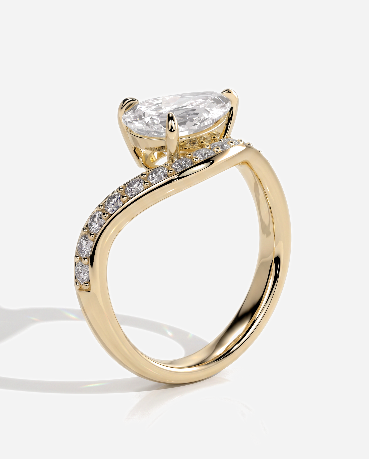 Ellis Pear Claw Solitaire with Bead Set Pave Wave Band and East West Setting Engagement Ring, lab grown diamond in yellow gold, three quarter view