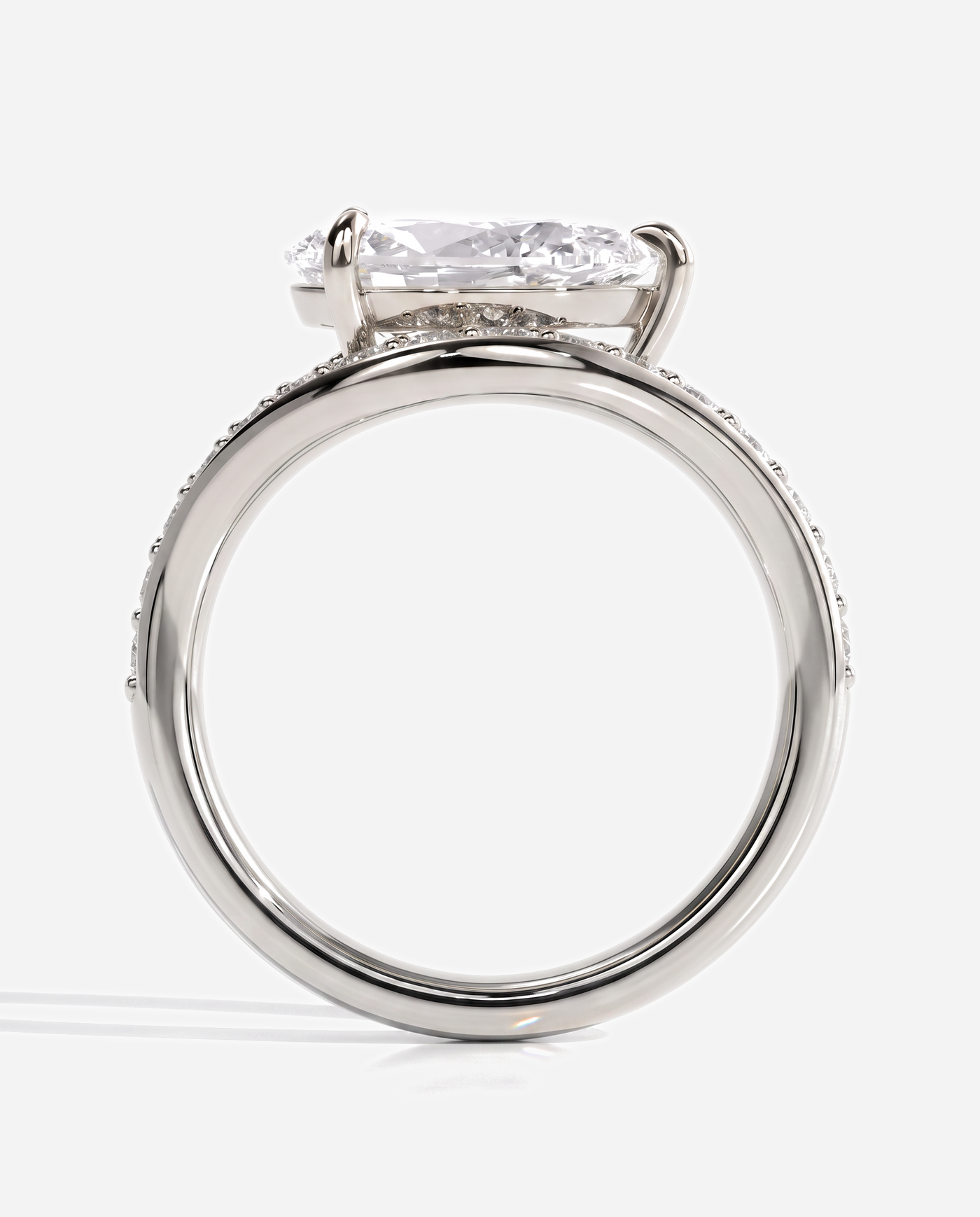 Ellis Pear Claw Solitaire with Bead Set Pave Wave Band and East West Setting Engagement Ring, lab grown diamond in platinum, side profile