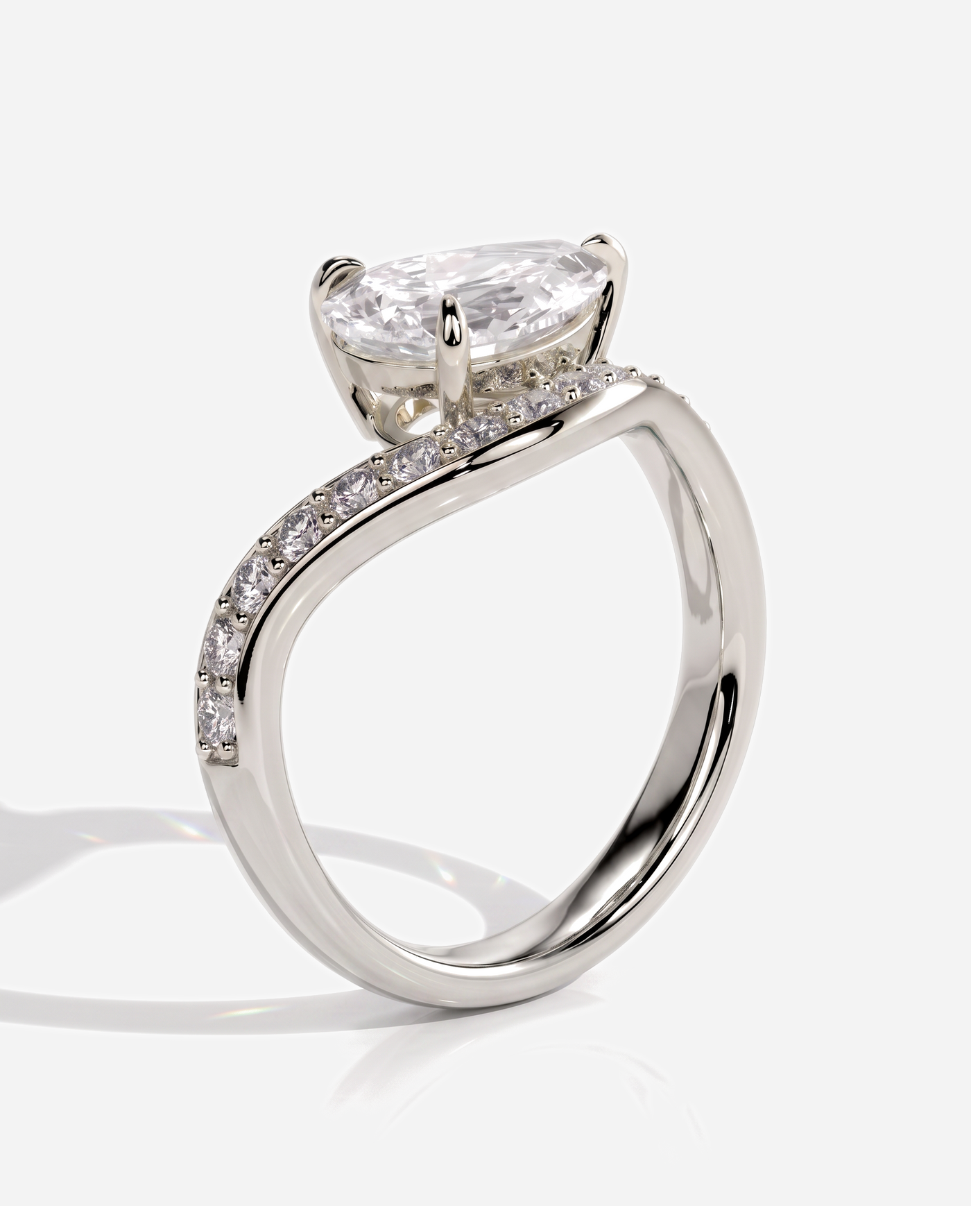Ellis Pear Claw Solitaire with Bead Set Pave Wave Band and East West Setting Engagement Ring, lab grown diamond in white gold, three quarter view