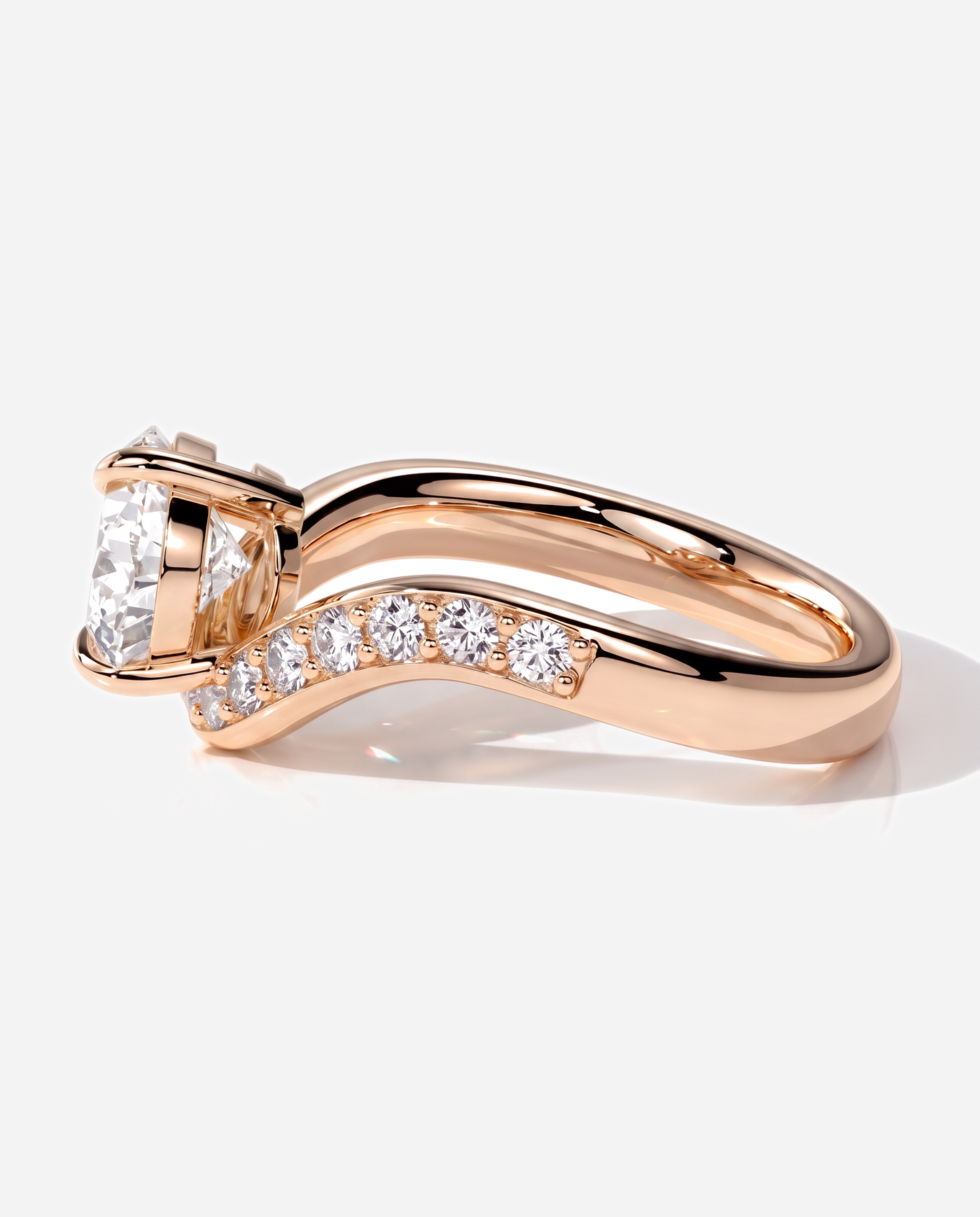 Ellis Pear Claw Solitaire with Bead Set Pave Wave Band and East West Setting Engagement Ring, lab grown diamond in rose gold, detail view