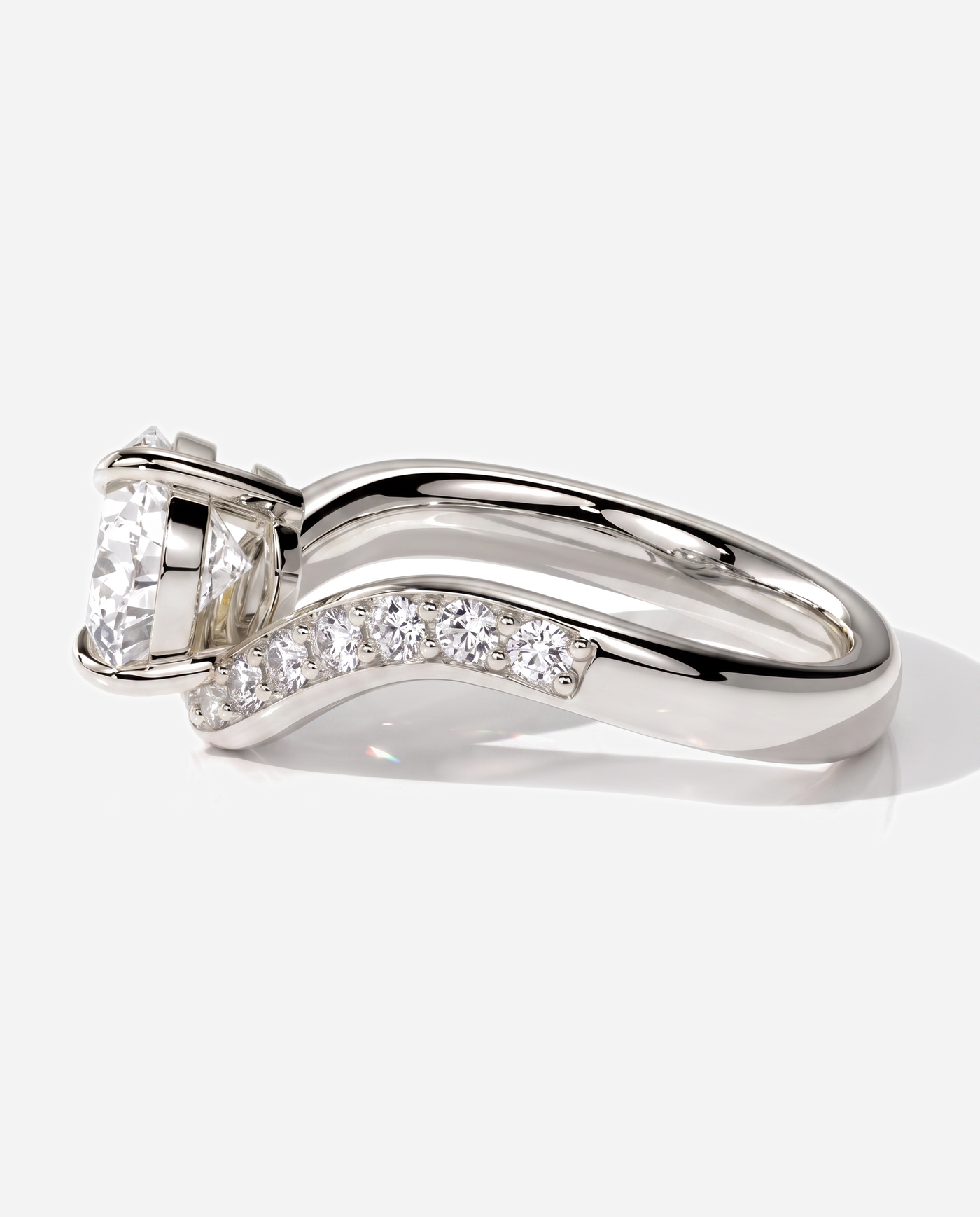 Ellis Pear Claw Solitaire with Bead Set Pave Wave Band and East West Setting Engagement Ring, lab grown diamond in platinum, detail view