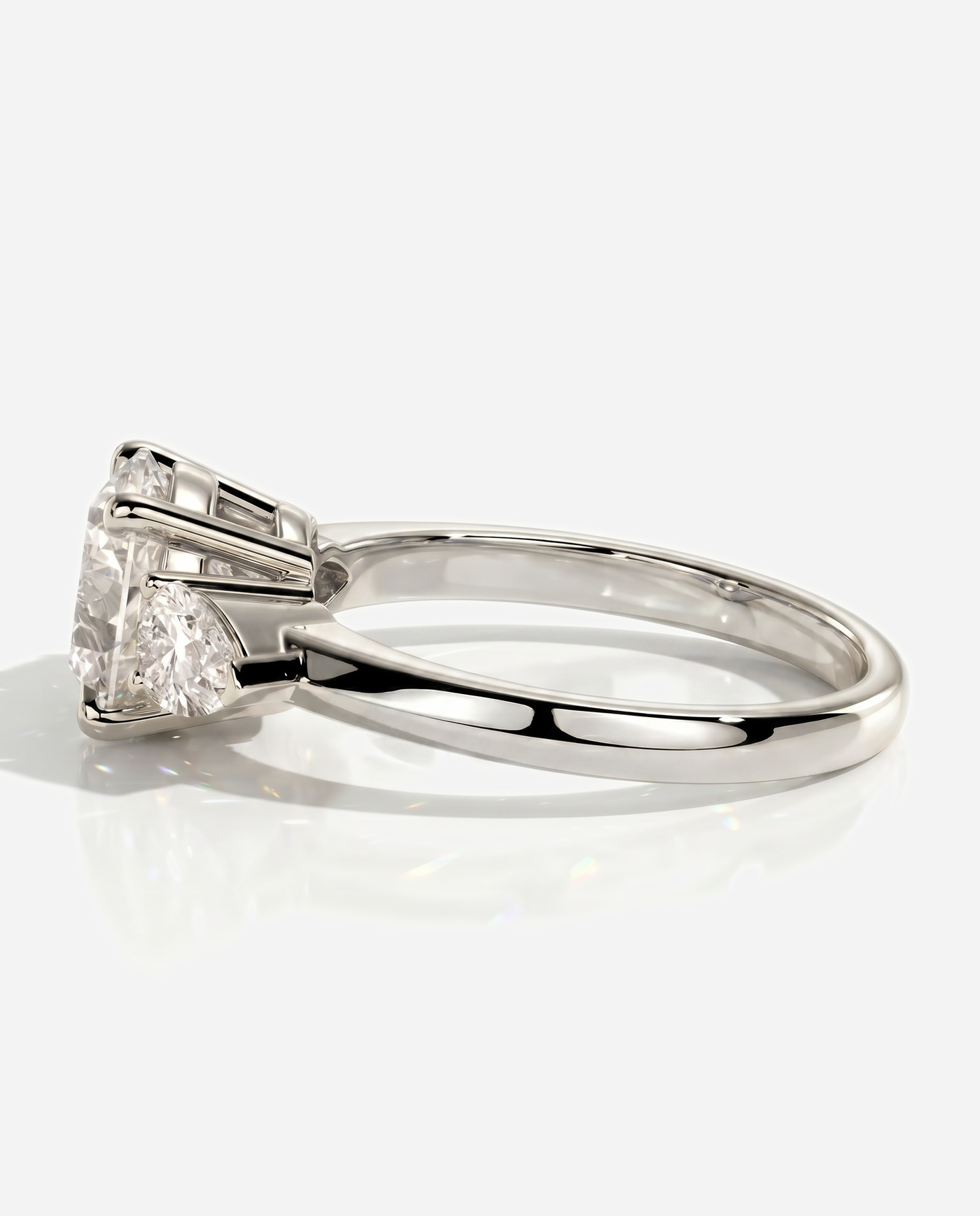 Alyssa Round Claw Trilogy with Pear Side Stones and Knife Edge Band Engagement Ring, lab grown diamond in white gold, detail view
