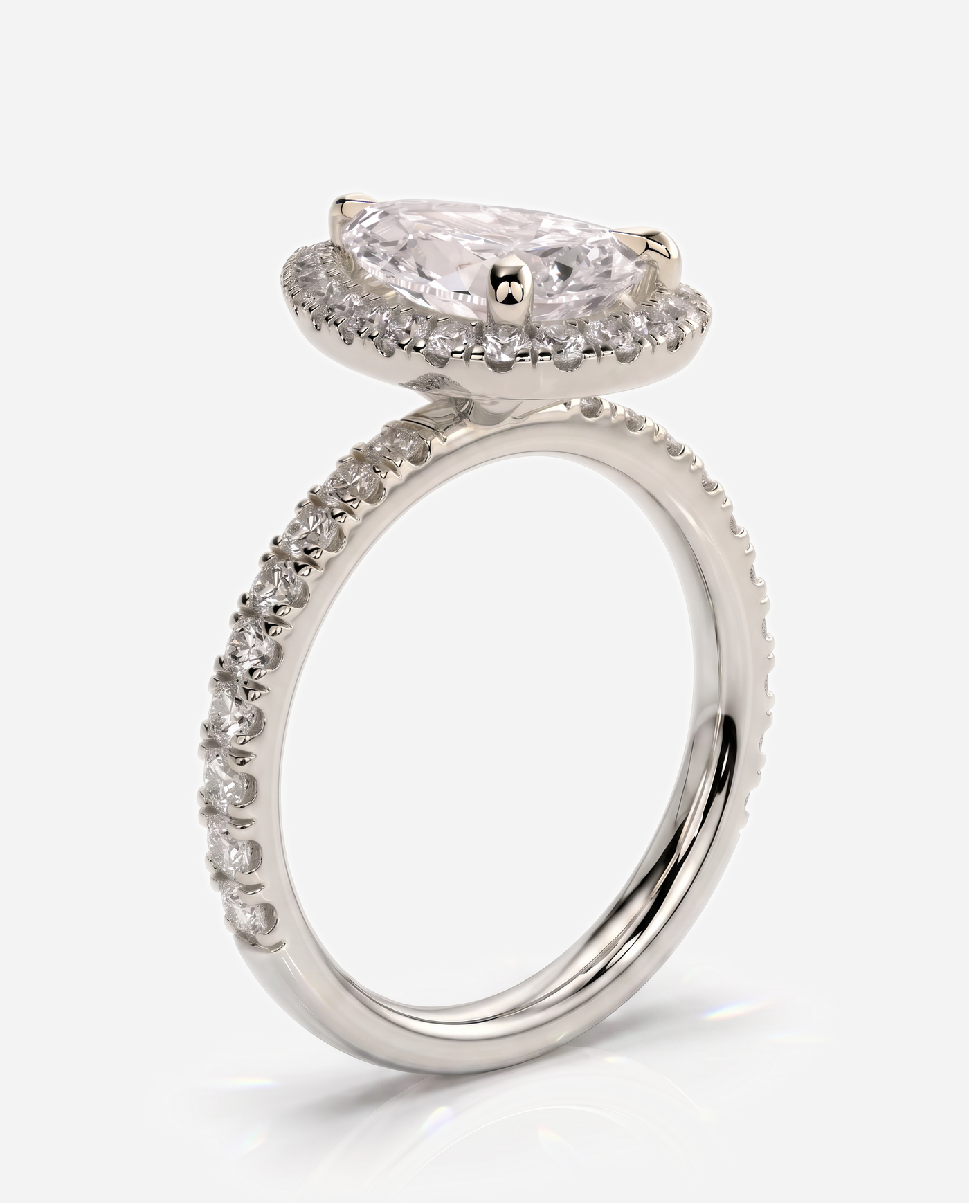 Natalia Pear Claw Solitaire with Halo and Pave Band Engagement Ring, lab grown diamond in white gold, three quarter view