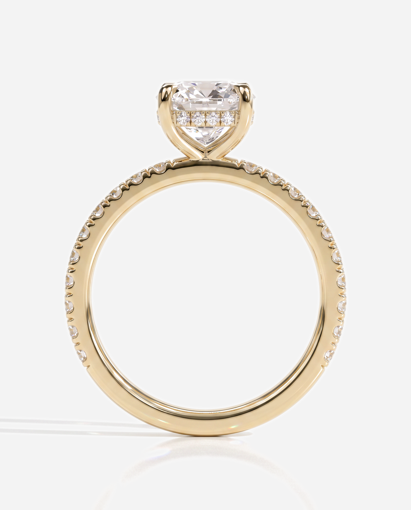 Cadence Cushion Claw Solitaire with Hidden Halo and Pave Band Engagement Ring, lab grown diamond in yellow gold, side profile