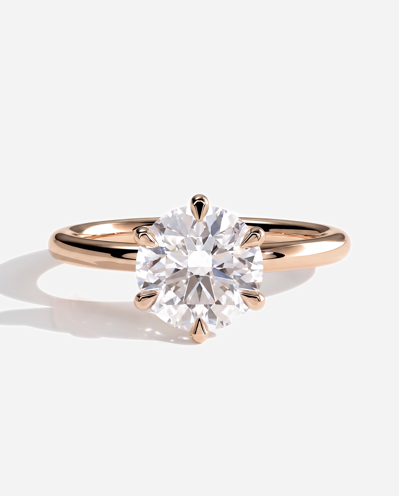 Martha Round Claw Solitaire Engagement Ring, lab grown diamond in rose gold, front view