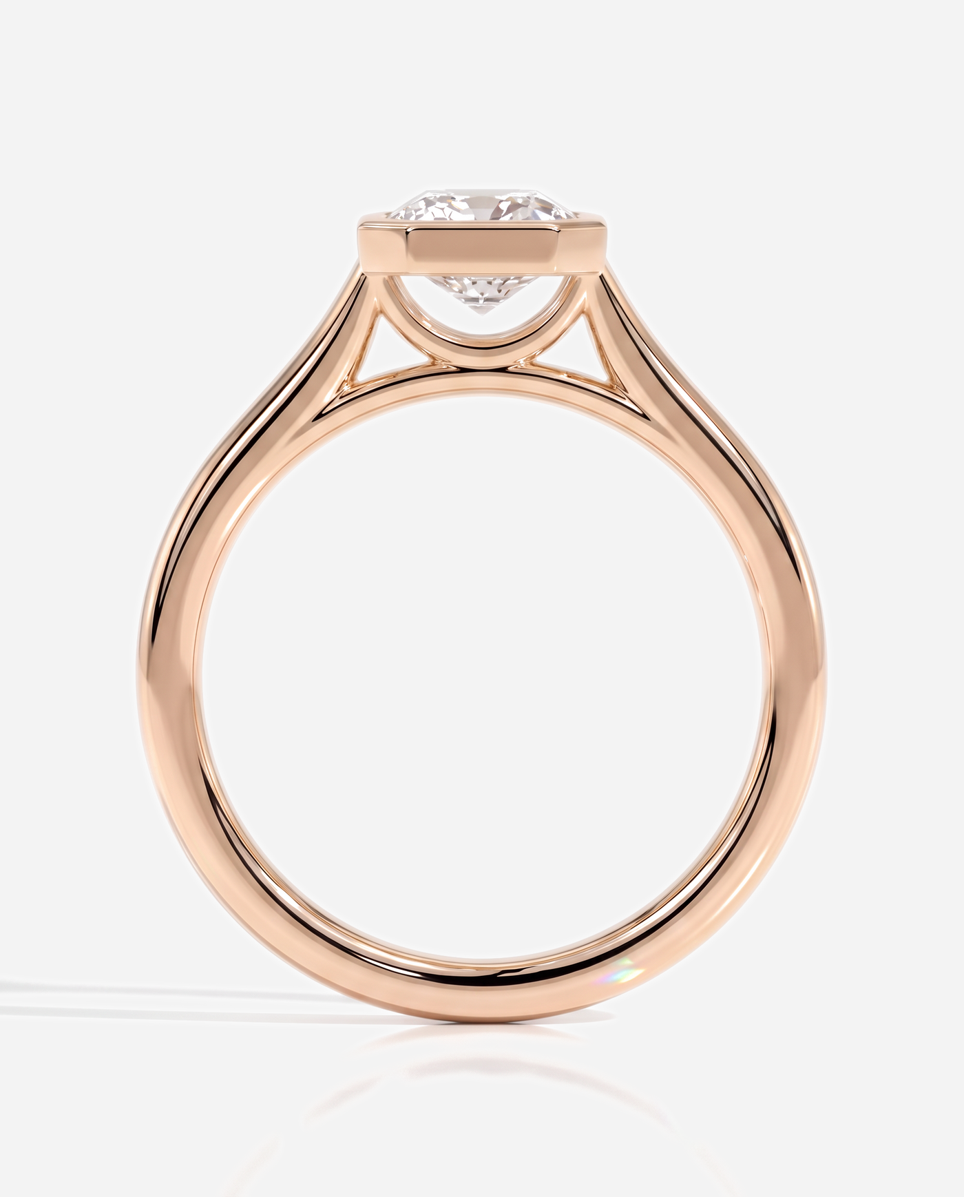 Sutton Emerald Bezel Solitaire with Cathedral Setting Engagement Ring, lab grown diamond in rose gold, side profile