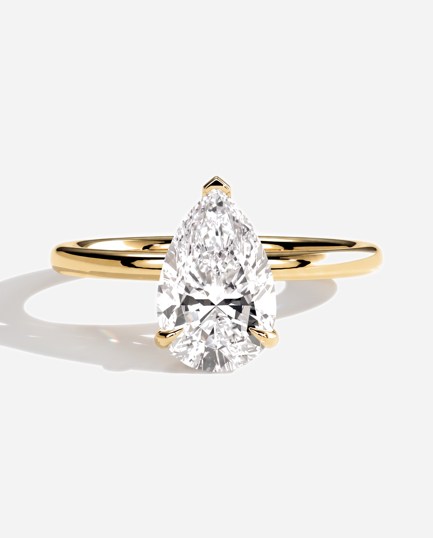 Olivia Pear Claw Solitaire Engagement Ring, lab grown diamond in yellow gold, front view