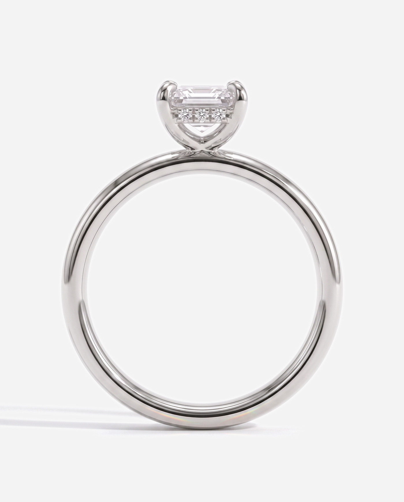 Blaire Emerald Claw Solitaire with Cigar Band and Hidden Halo Engagement Ring, lab grown diamond in white gold, side profile